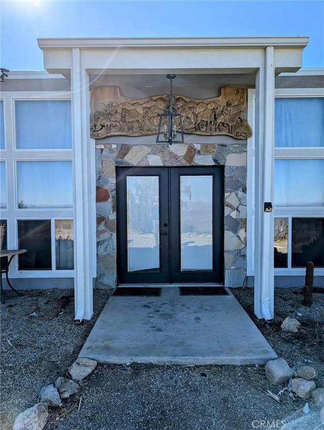 doorway to property featuring french doors