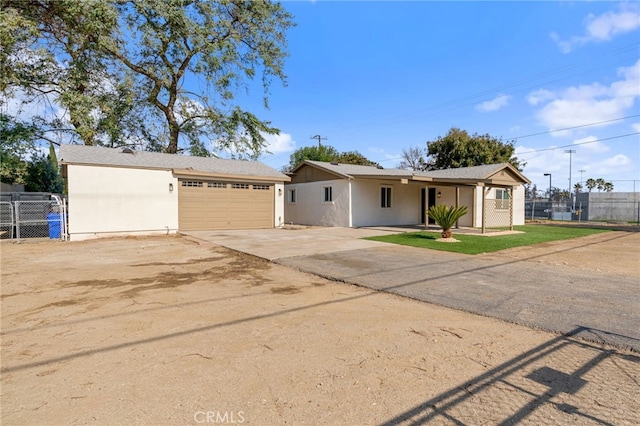 ranch-style home with a garage