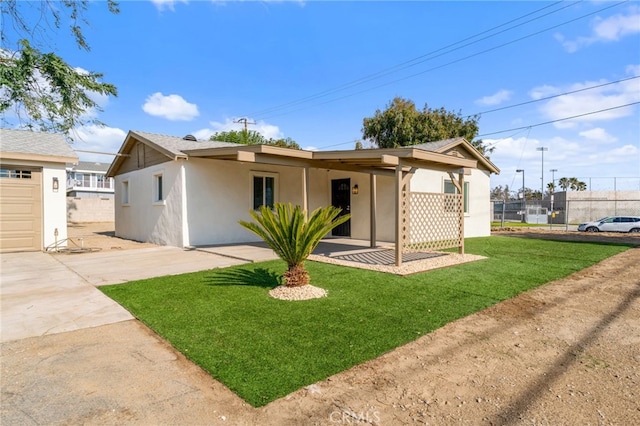 ranch-style home with a front lawn