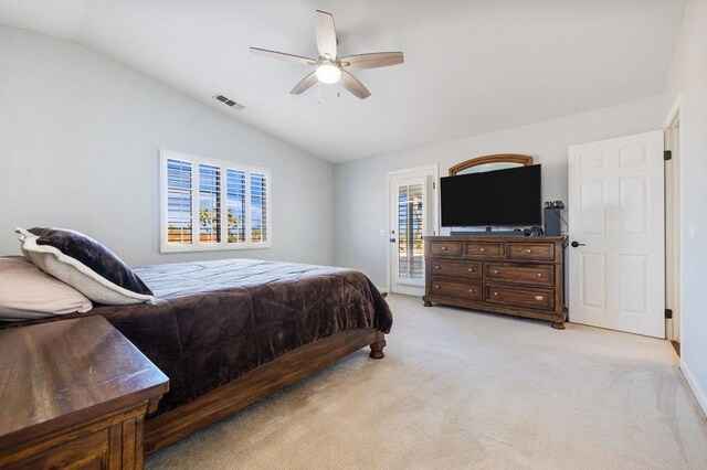 bedroom featuring ceiling fan, light colored carpet, vaulted ceiling, and access to exterior