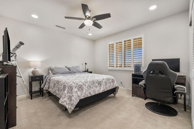 carpeted bedroom featuring ceiling fan