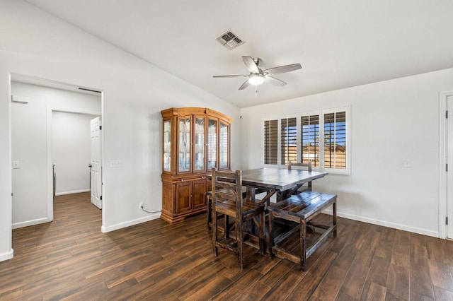 dining area featuring ceiling fan and dark wood-type flooring