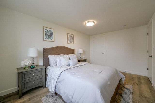 bedroom featuring light hardwood / wood-style flooring