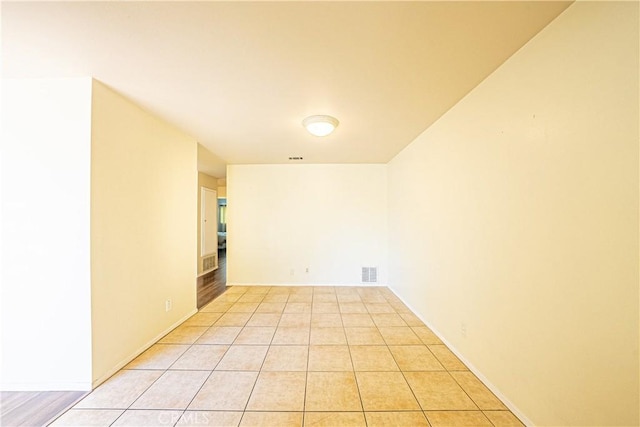 view of tiled spare room