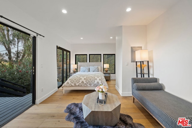 bedroom featuring light wood-type flooring