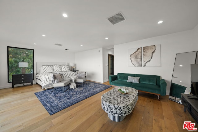 bedroom featuring hardwood / wood-style flooring