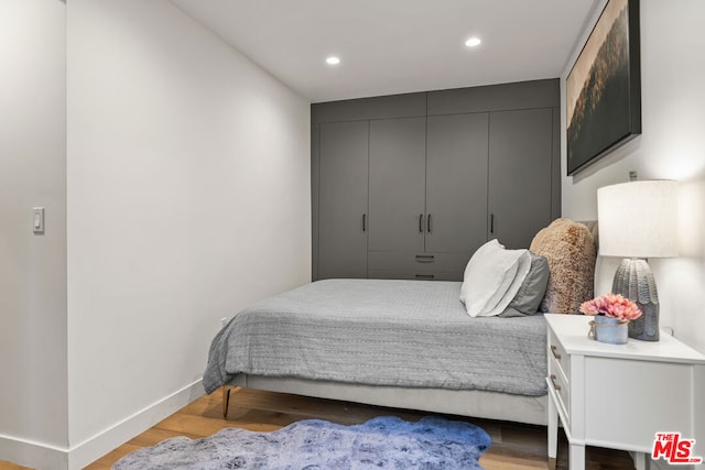 bedroom featuring light wood-type flooring