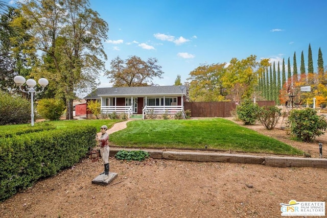 ranch-style home with a front yard