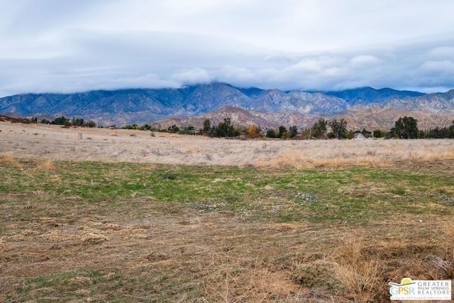 view of mountain feature featuring a rural view