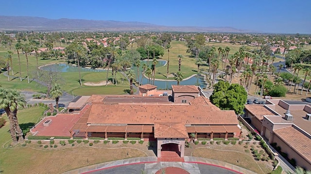 aerial view featuring a water and mountain view