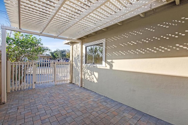 view of patio featuring a pergola