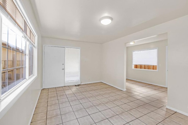 view of tiled spare room