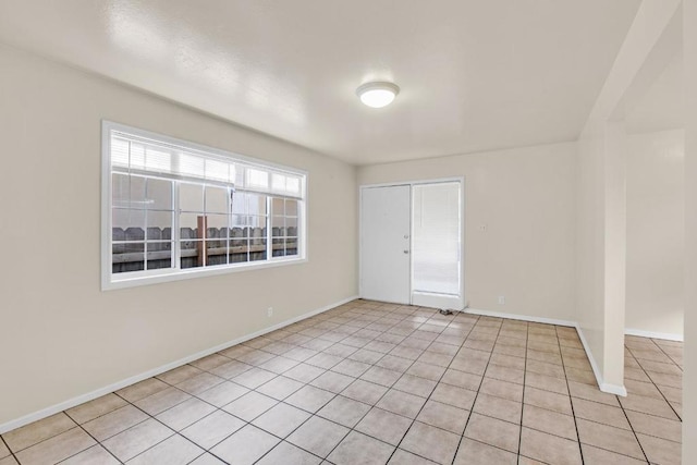 view of tiled spare room