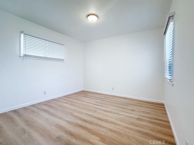 empty room featuring light hardwood / wood-style floors