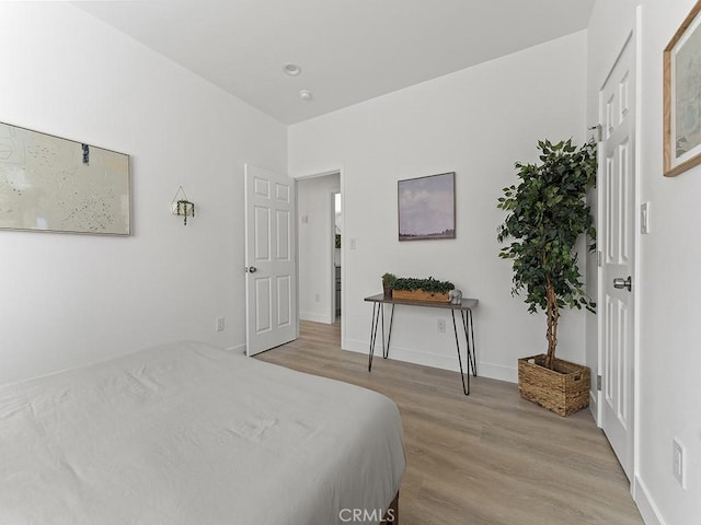 bedroom featuring light wood-type flooring