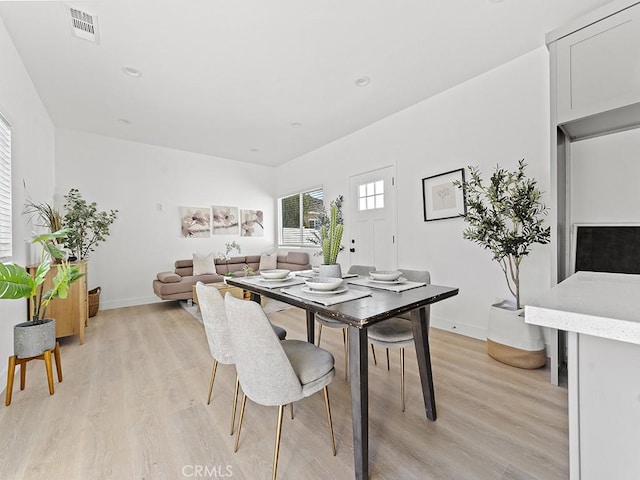 dining area featuring light hardwood / wood-style floors