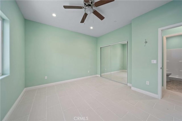 unfurnished bedroom with ceiling fan, light tile patterned floors, and a closet