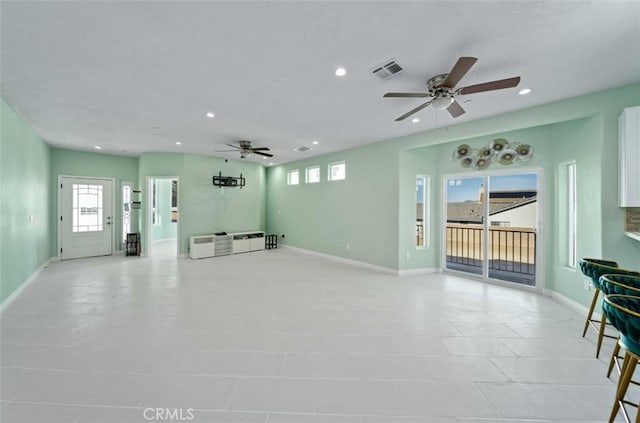 living room featuring ceiling fan