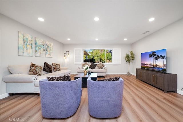 living room featuring light hardwood / wood-style flooring