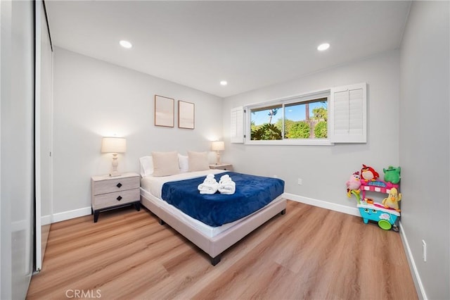 bedroom featuring hardwood / wood-style floors