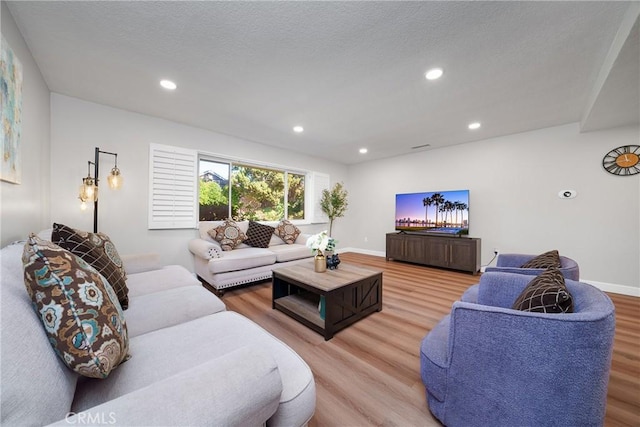 living room with hardwood / wood-style floors