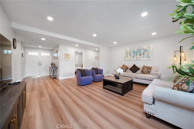 living room featuring light wood-type flooring