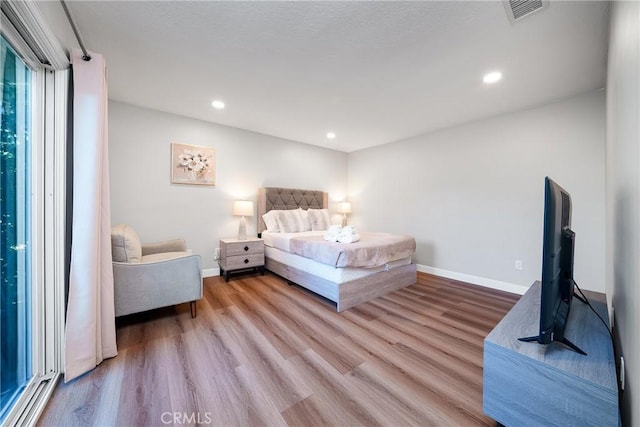 bedroom featuring light wood-type flooring