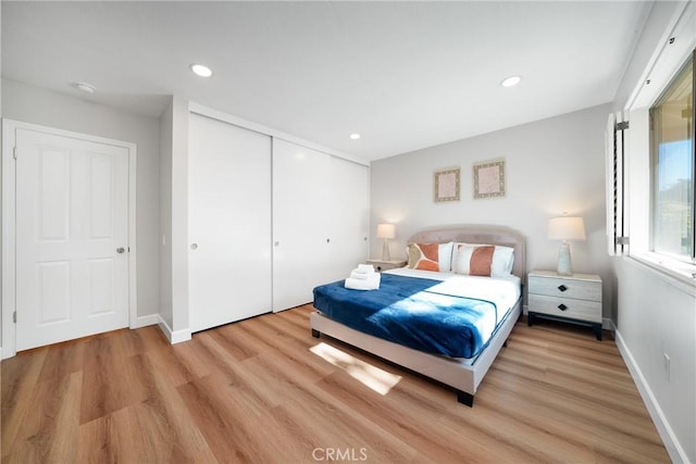 bedroom with light wood-type flooring