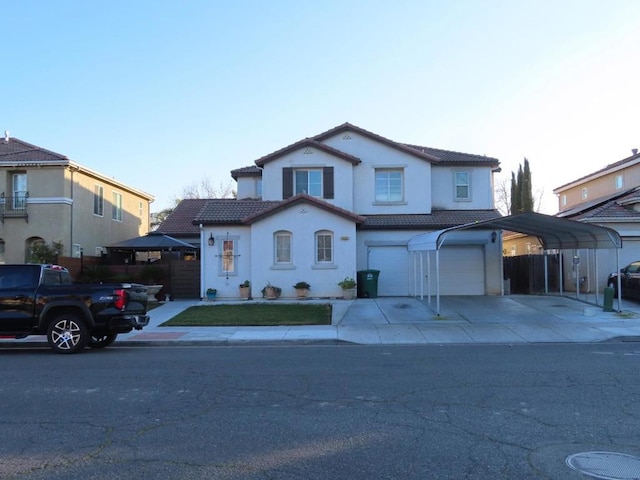 view of front property featuring a garage and a carport