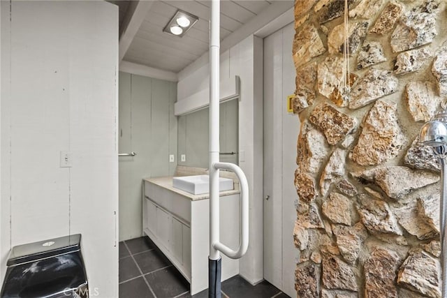 bathroom with tile patterned flooring and sink