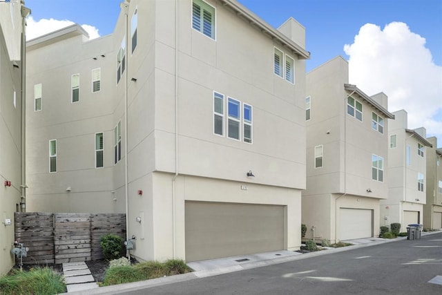 exterior space with a garage