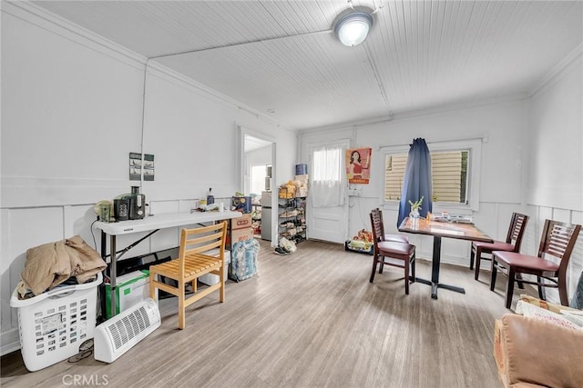 interior space with crown molding and hardwood / wood-style floors