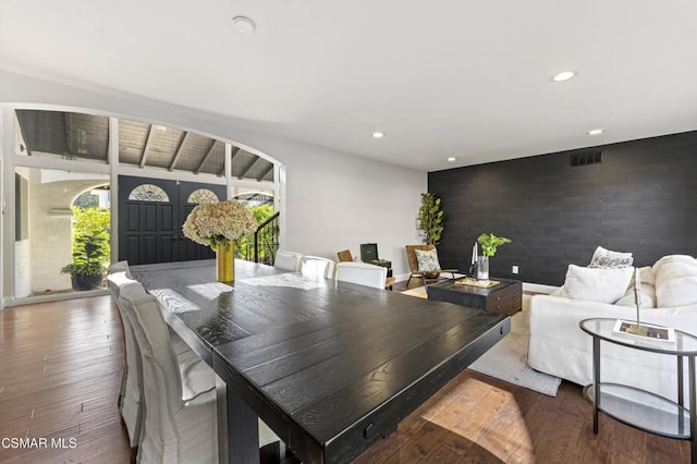 dining space featuring french doors and hardwood / wood-style flooring