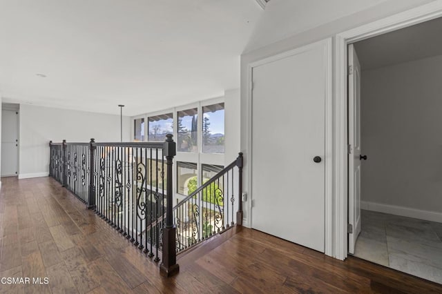 hallway featuring dark hardwood / wood-style floors