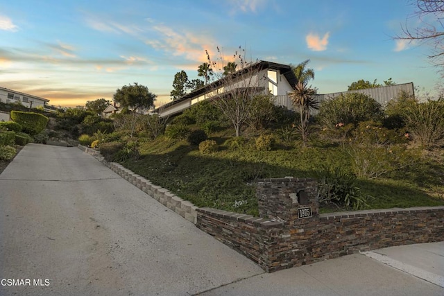 view of property exterior at dusk