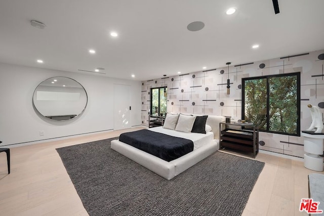 bedroom with light wood-type flooring