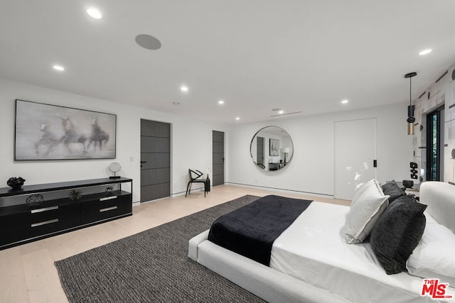 bedroom featuring light wood-type flooring