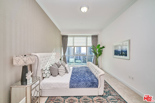 carpeted bedroom featuring crown molding