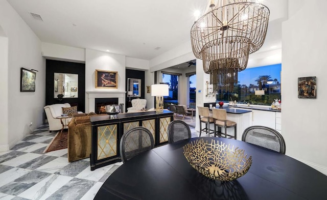 dining space featuring an inviting chandelier