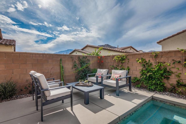 view of patio with a pool