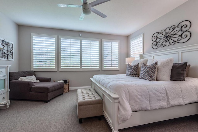 bedroom with ceiling fan and carpet floors