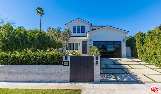 view of front of property featuring a garage