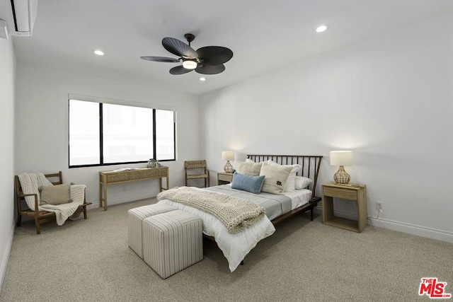 bedroom with ceiling fan and light colored carpet