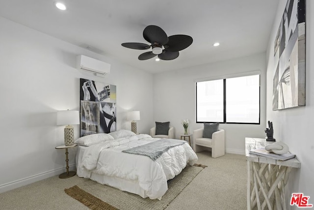 carpeted bedroom featuring ceiling fan and a wall mounted AC