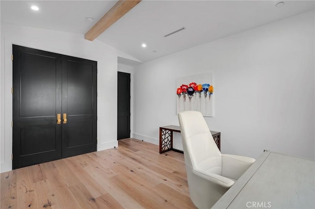 office with vaulted ceiling with beams and light hardwood / wood-style flooring