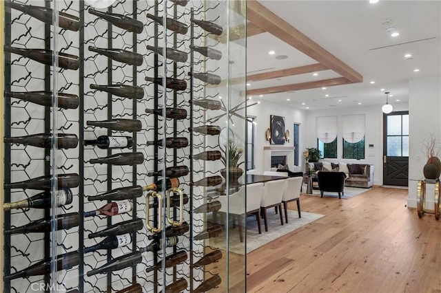 wine area with light wood-type flooring