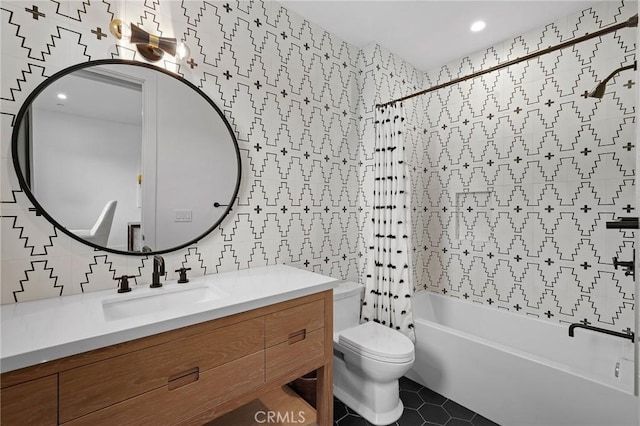 full bathroom featuring toilet, tile patterned flooring, tile walls, shower / tub combo, and vanity