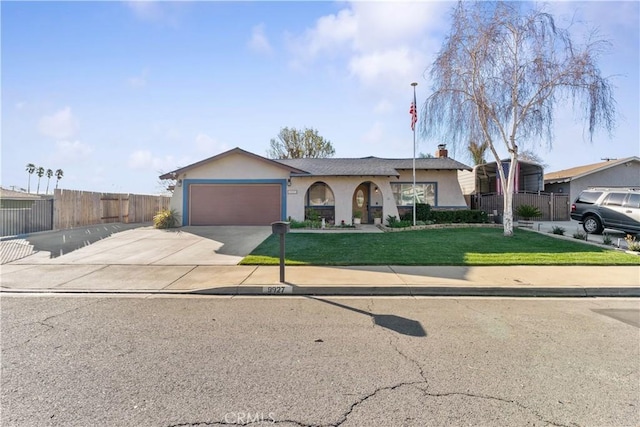 single story home with a front lawn and a garage