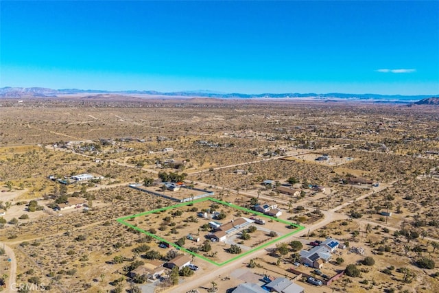 aerial view featuring a mountain view