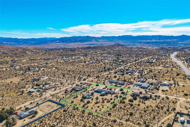 aerial view featuring a mountain view